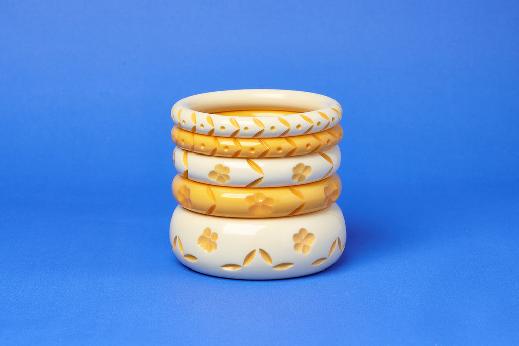 Splendette vintage inspired 1940s style carved floral yellow Primrose and Cream bangle stack