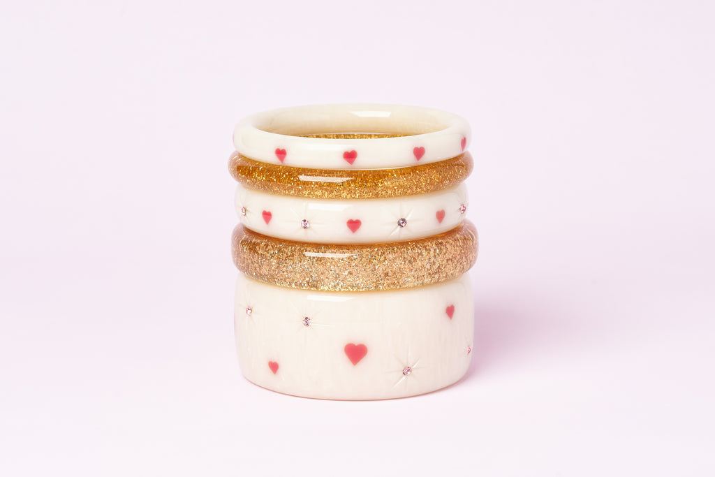 Splendette vintage inspired 1950s Valentines style white fakelite Sugar Heart bangle stack with pale gold glitter bangles