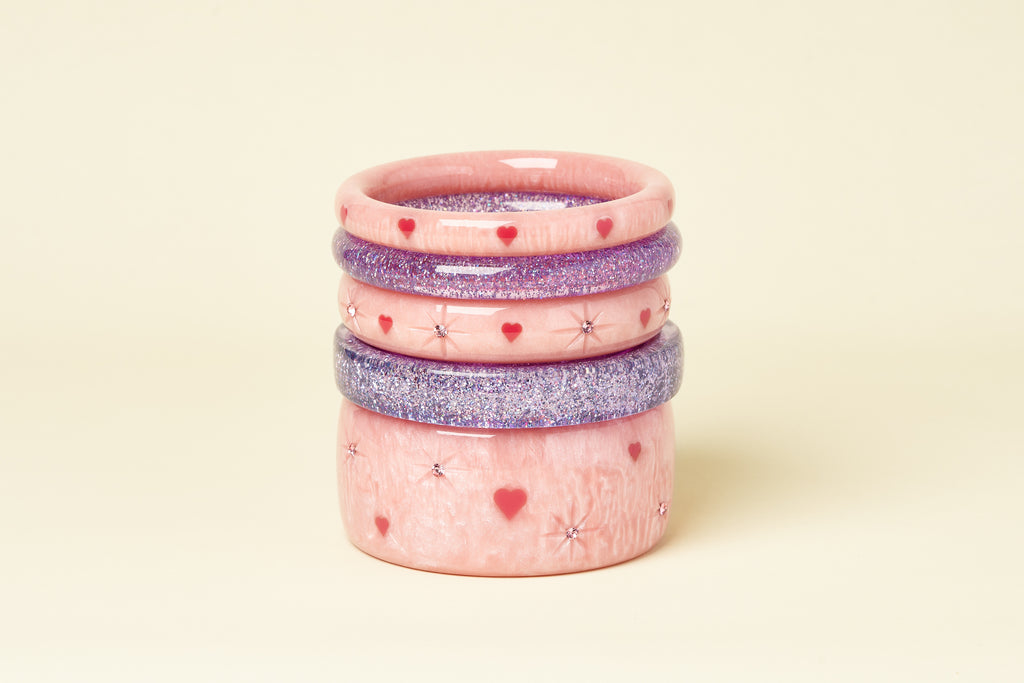 Splendette vintage inspired 1950s Valentine's style pink Sweet Cheeks fakelite bangles with Lilac glitter bangles
