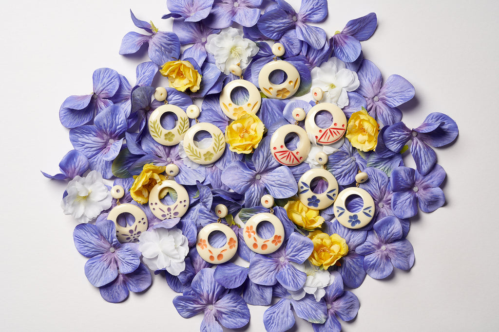 Splendette vintage inspired 1940s Bakelite style Spring Florals Cream Drop Hoop Earrings flat lay