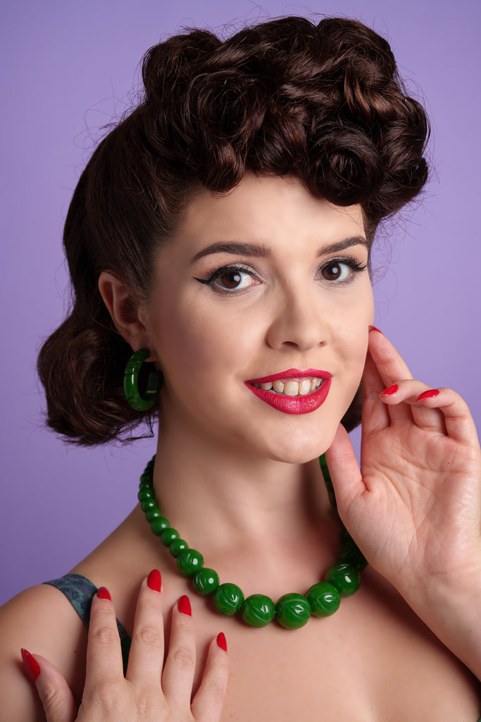 Splendette vintage inspired 1940s Bakelite style green Forest Heavy Carve Hoop Earrings and Bead Necklace worn by model