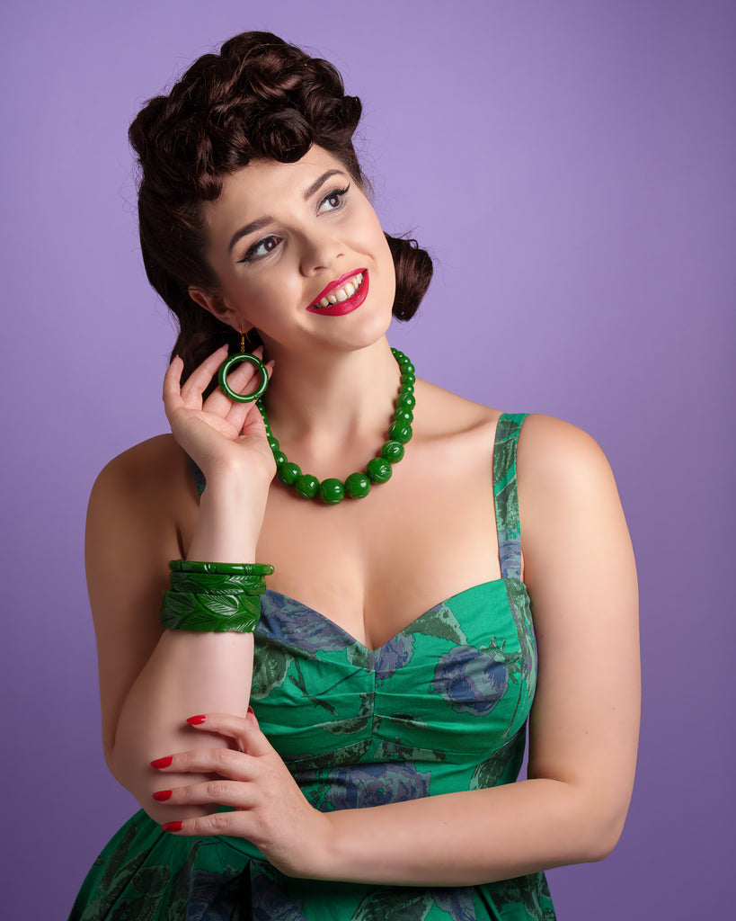 Splendette vintage inspired 1940s Bakelite style green Forest Heavy Carve Fakelite jewellery worn by model