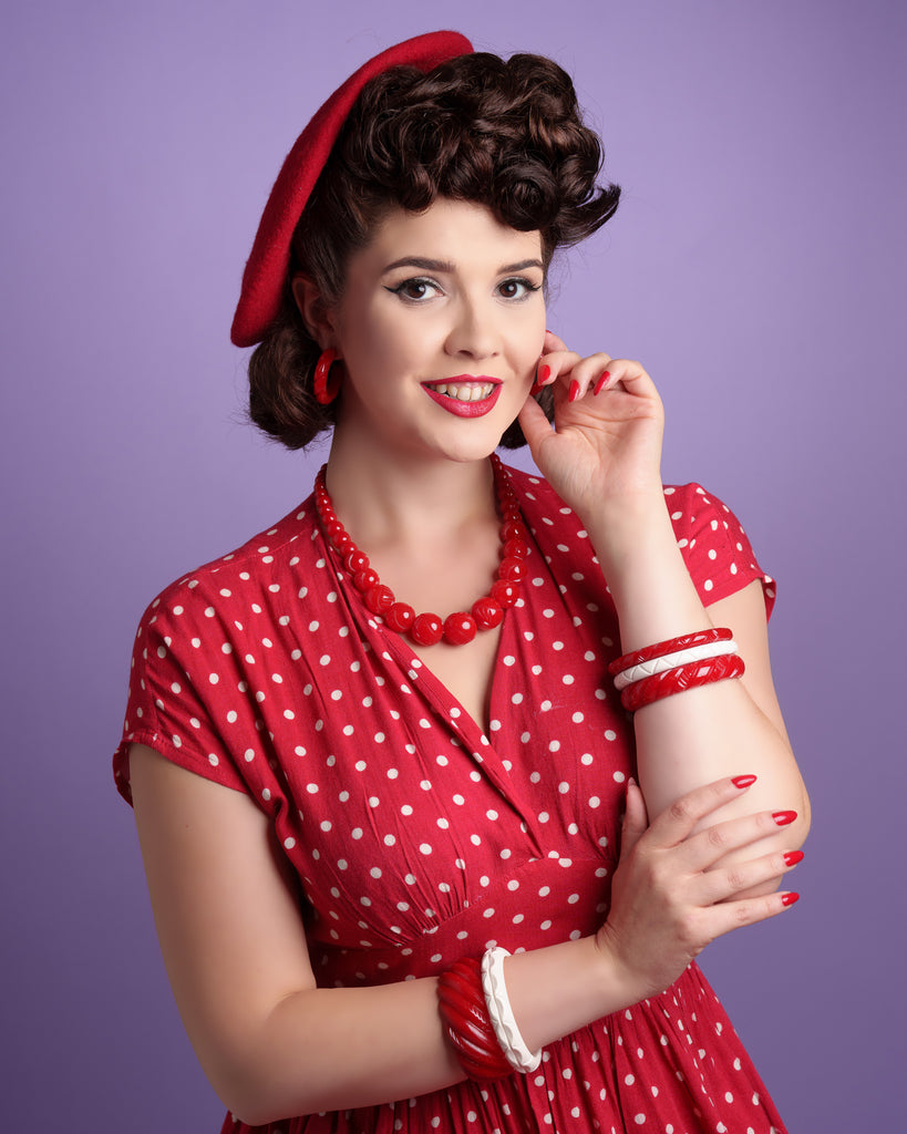 Splendette vintage inspired 1940s style Red and white Salty Heavy Carve fakelite jewellery worn by pin up model