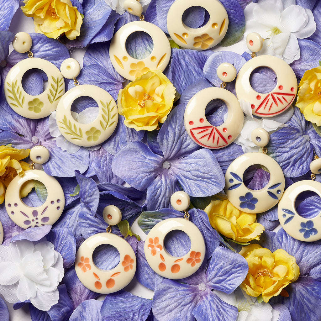 Splendette vintage inspired 1940s style floral pastel carved fakelite Cream Drop Hoop Earrings flat lay