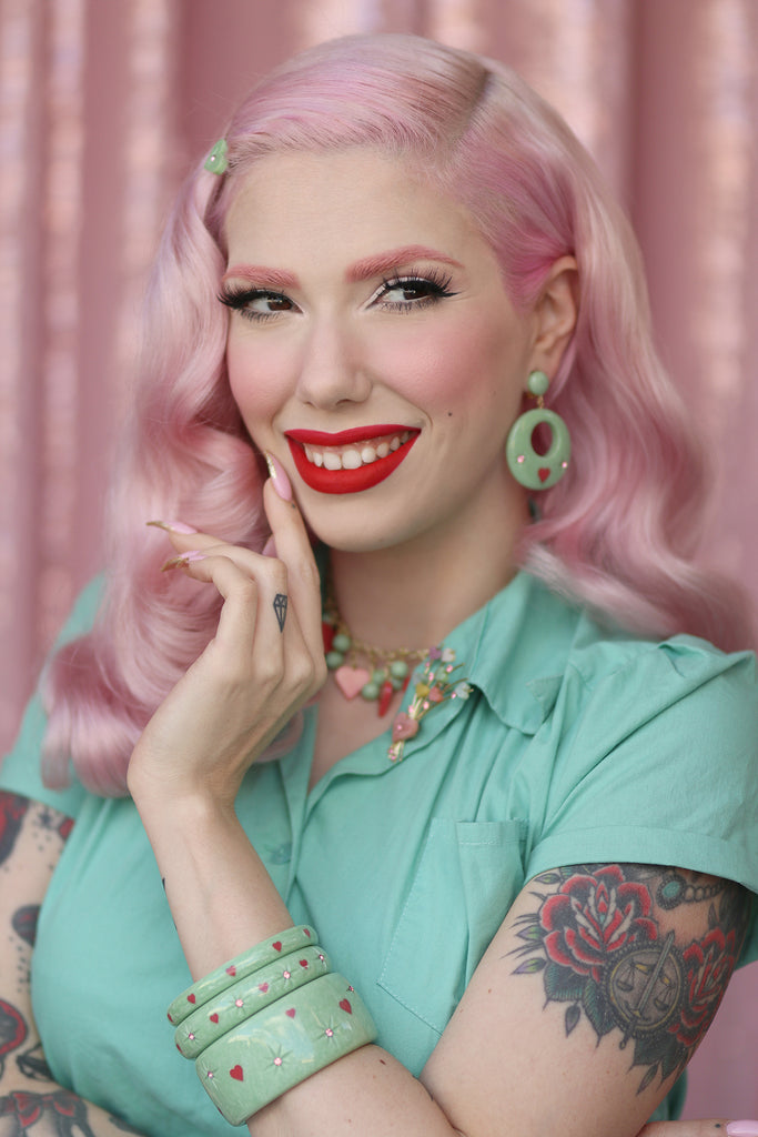 Splendette vintage inspired 1950s Valentine's style pastel green Sweet Pea fakelite jewellery worn by pin up model Dafna Bar-El
