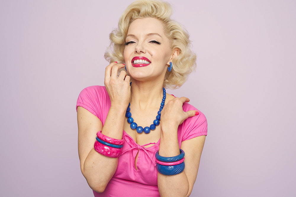 Marilyn Monroe lookalike Suzie Kennedy in blue and pink bangles