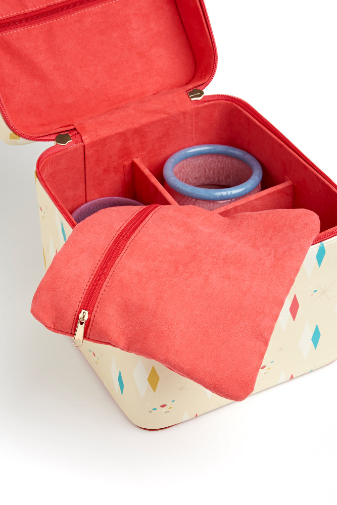 Open jewellery box in atomic diamonds design with pouch