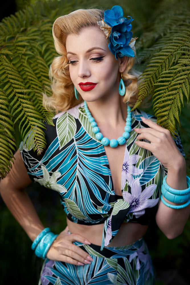 1940s fashion model shot wearing Humanitea turquoise bakelite style bangles