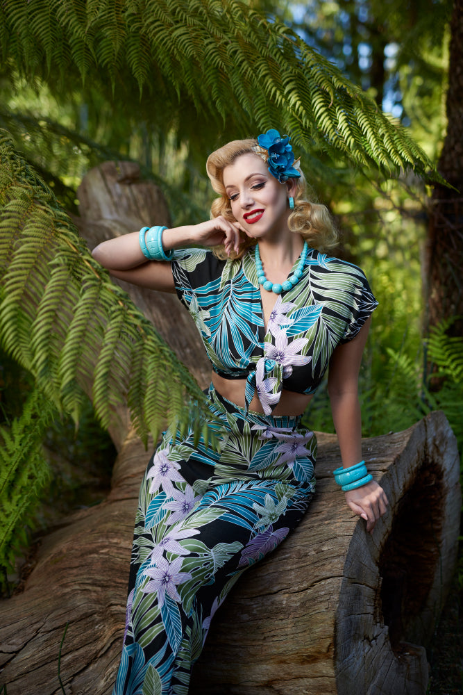 1940s fashion model shot wearing Humanitea turquoise bakelite style bangles