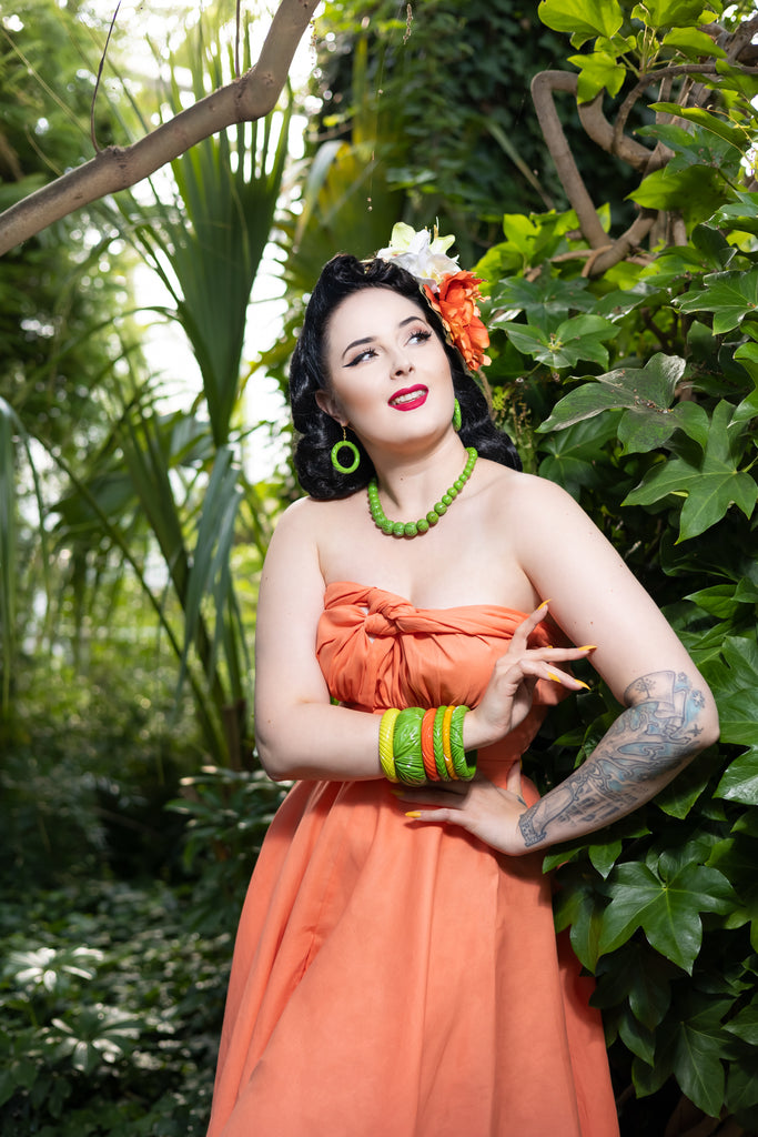 Splendette vintage inspired 1940s Bakelite style green Palm Heavy Carve Fakelite jewellery worn by pin up model