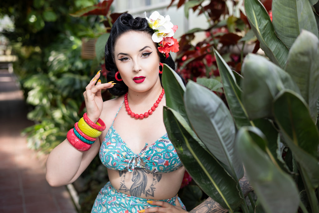 Splendette vintage inspired 1950s tropical style pink Hibiscus, green Chartreuse and turquoise Jade jewellery worn by pin up model