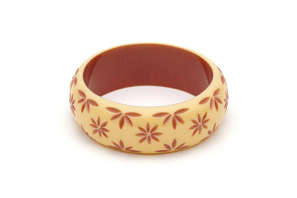 Splendette vintage inspired 1950s style cream carved Duotone fakelite Wide Lait Carved Bangle in Duchess size
