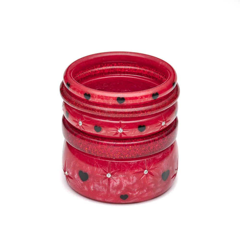 Splendette vintage inspired 1950s Valentine's style stack of red Heartthrob Starburst Bangles with red glitter bangles