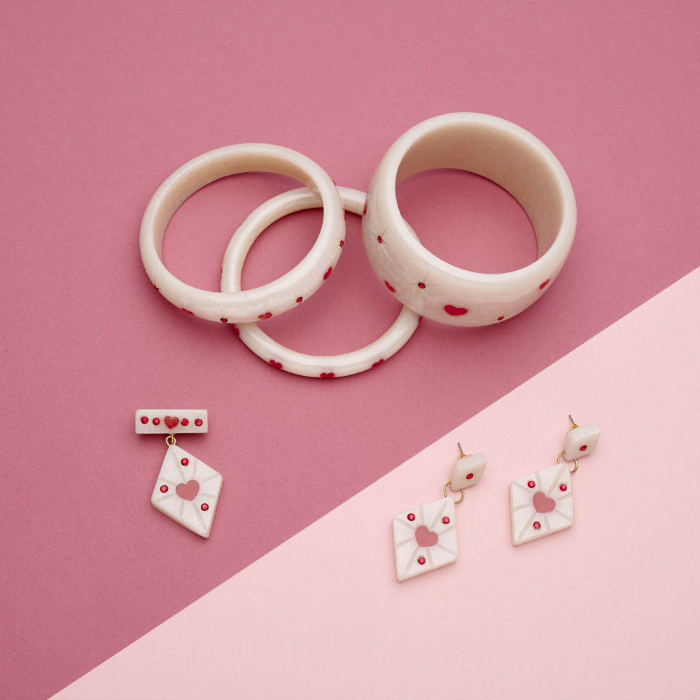 Splendette vintage inspired 1950s style Valentine's white Secret Admirer Starburst Bangles, Earrings and Brooch flat lay