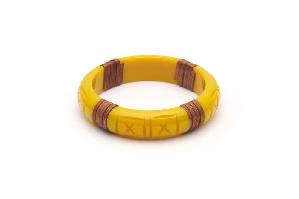Splendette vintage inspired 1940s 1950s tropical style carved yellow fakelite Midi Ochre Mid Cane Bangle in Classic size.