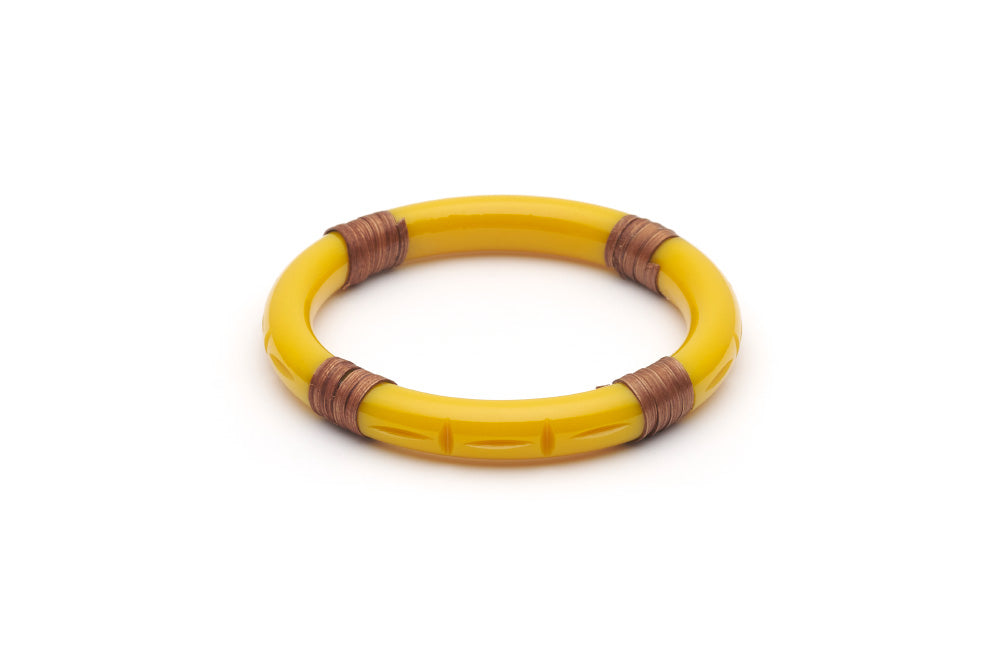Splendette vintage inspired 1940s 1950s tropical style carved yellow fakelite Narrow Ochre Mid Cane Bangle in Classic size.