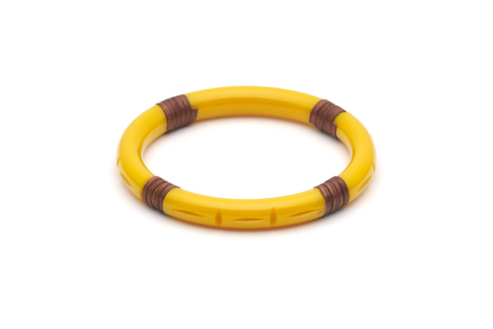 Splendette vintage inspired 1940s 1950s tropical style carved yellow fakelite Narrow Ochre Mid Cane Bangle in larger Duchess size.