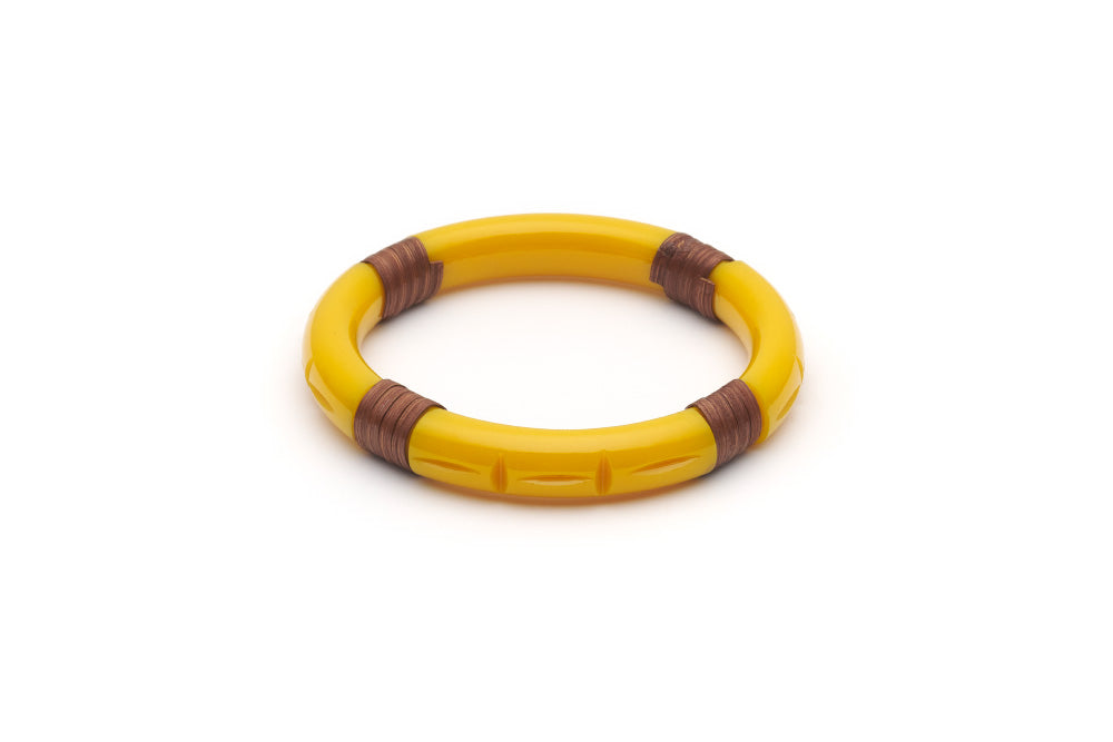 Splendette vintage inspired 1940s 1950s tropical style carved yellow fakelite Narrow Ochre Mid Cane Bangle in smaller Maiden size.