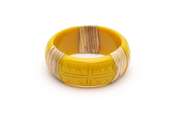 Splendette vintage inspired 1940s 1950s tropical style carved yellow fakelite Wide Ochre Light Cane Bangle in Classic size.
