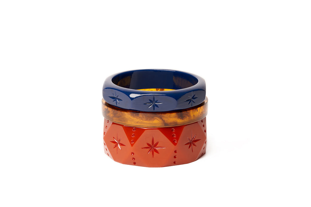 Splendette vintage inspired 1970s style bangles stack with orange Wide Rust, Narrow Tortoiseshell and navy blue Midi Darkness