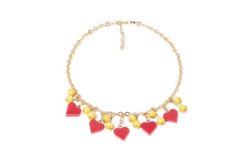 Splendette vintage inspired 1950s kitsch Valentine's style pastel yellow carved fakelite Honey Bunch Heart Necklace