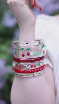 Splendette vintage inspired 1940s Bakelite style rockabilly red Cherries jewellery worn by pin up model